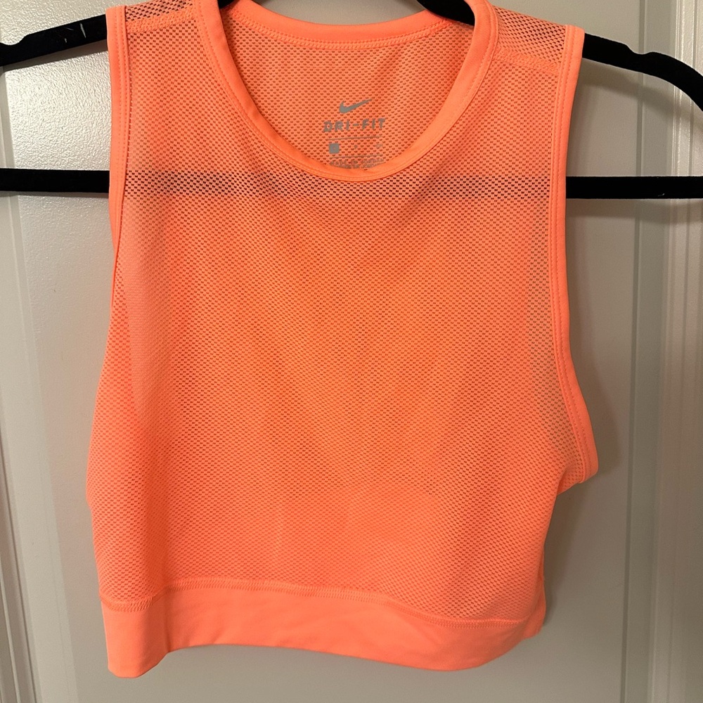 Orange/peach Nike cropped mesh workout top